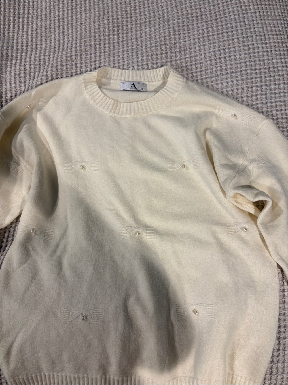 Cream Crewneck Sweater with Embellished Detail
